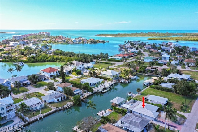 aerial view featuring a water view and a residential view