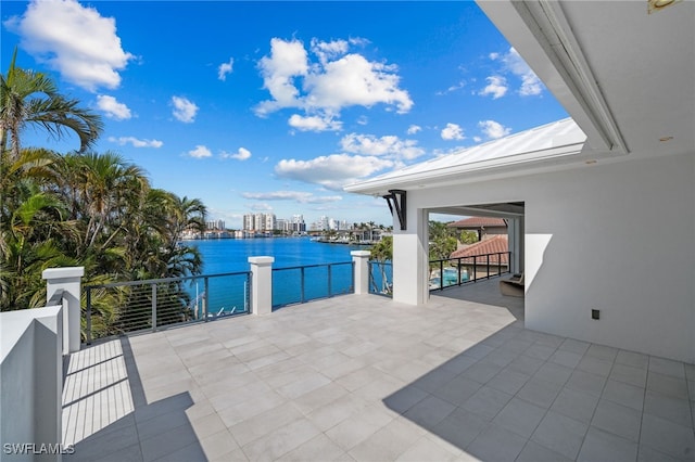 view of patio featuring a water view