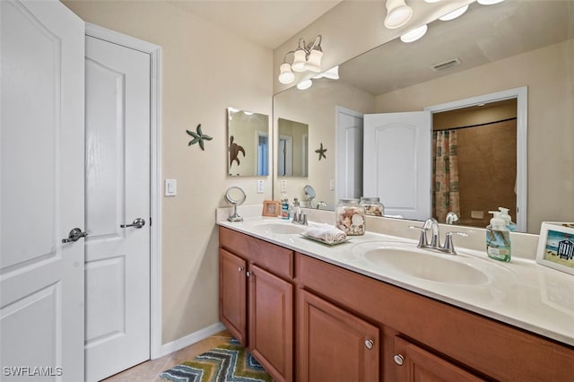 bathroom featuring vanity and tile patterned floors