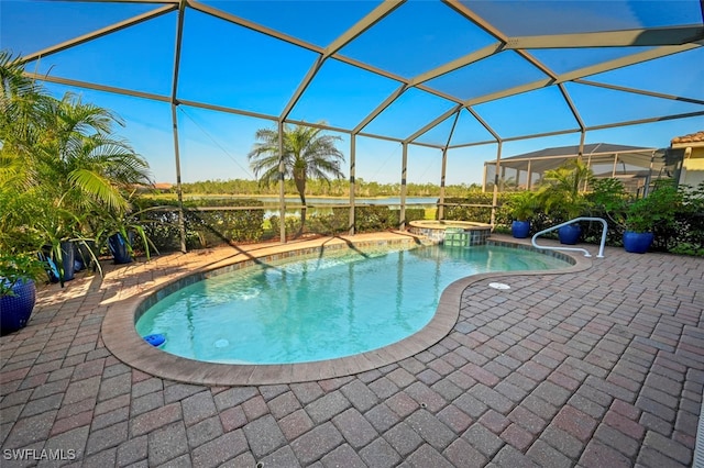 view of swimming pool featuring an in ground hot tub, a patio area, and glass enclosure