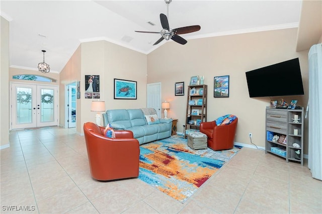 tiled living room featuring crown molding, ceiling fan, high vaulted ceiling, and french doors