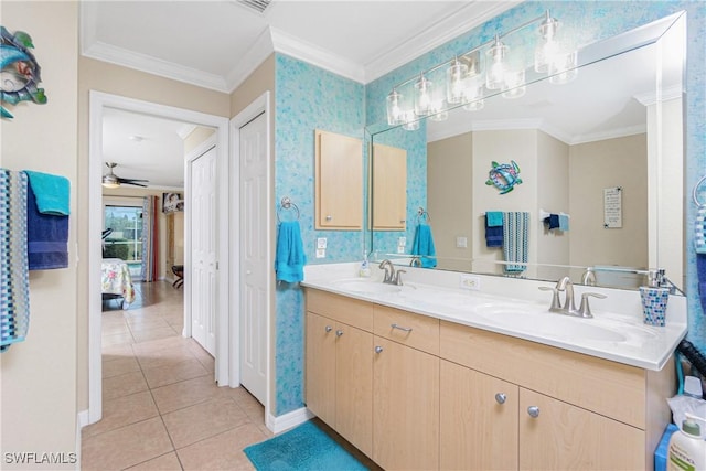 bathroom with crown molding, ceiling fan, vanity, and tile patterned flooring