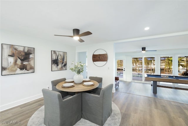 dining area with billiards, hardwood / wood-style floors, and ceiling fan