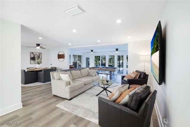 living room featuring light wood-type flooring