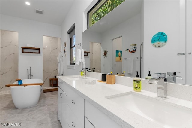 bathroom featuring vanity and plus walk in shower