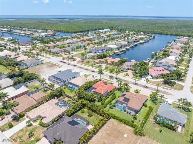 drone / aerial view with a water view