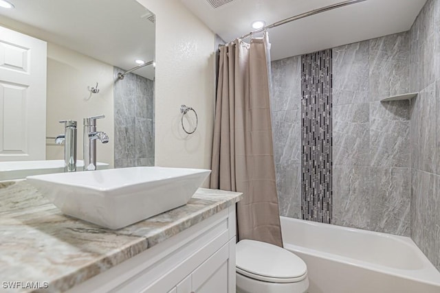 full bathroom with shower / tub combo, vanity, toilet, and recessed lighting