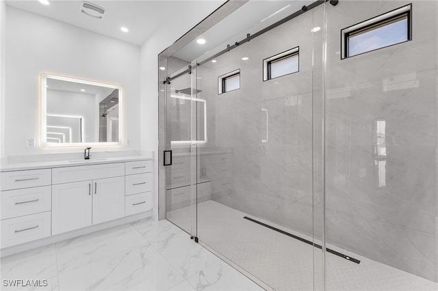 bathroom with vanity and walk in shower