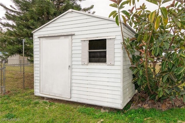 view of outdoor structure featuring a yard