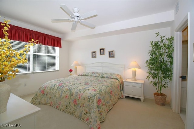 carpeted bedroom with ceiling fan