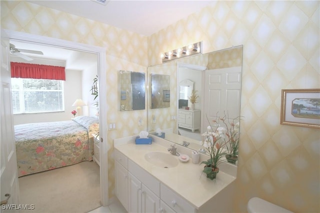 bathroom featuring vanity and ceiling fan