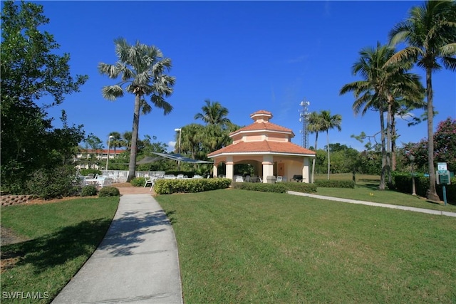 surrounding community featuring a gazebo and a yard