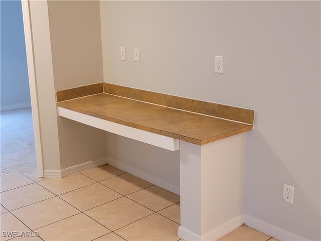 interior space with tile patterned floors