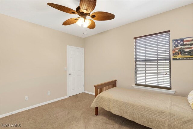 bedroom featuring carpet floors and ceiling fan