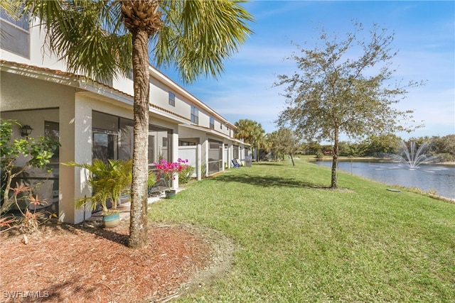 view of yard featuring a water view