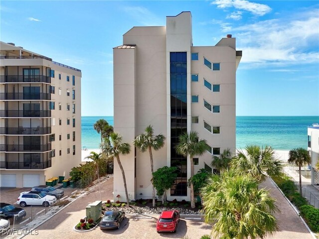 view of building exterior featuring a water view