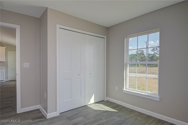 unfurnished bedroom featuring a closet