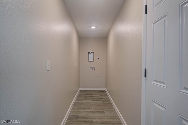 hall with light hardwood / wood-style flooring