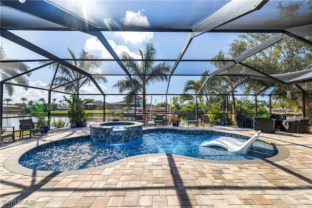 view of swimming pool featuring an in ground hot tub, a water view, glass enclosure, and a patio