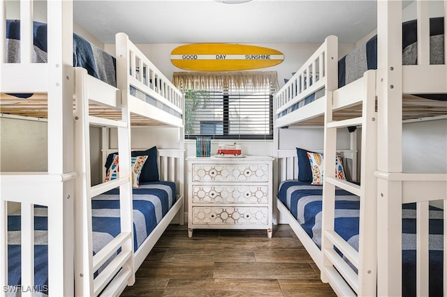 bedroom featuring dark wood-type flooring