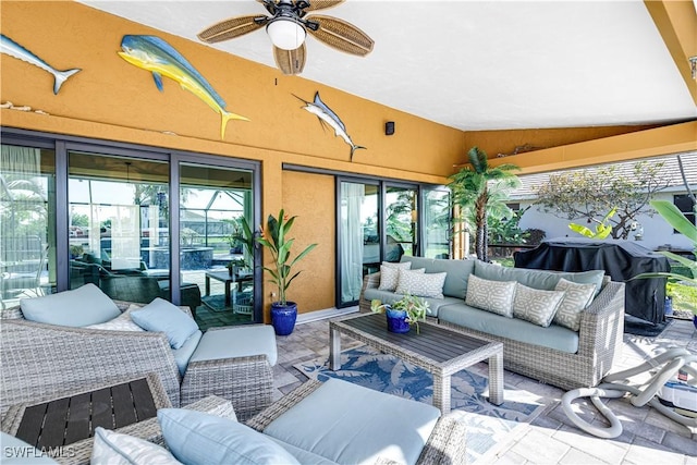 view of patio / terrace featuring ceiling fan, an outdoor living space, and area for grilling