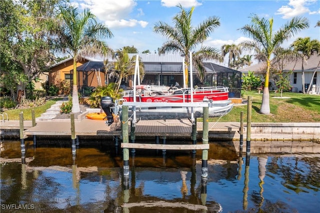 dock area with a water view and a lanai