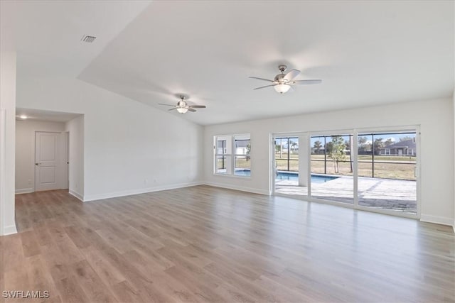 unfurnished living room with ceiling fan and light hardwood / wood-style flooring