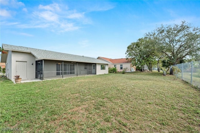 view of yard with a sunroom