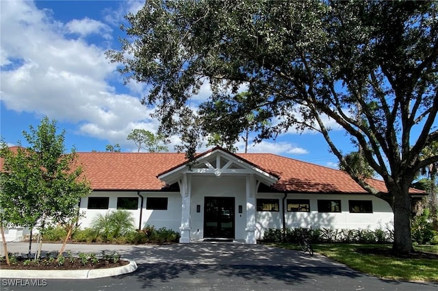 single story home with stucco siding