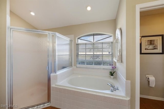 full bath featuring lofted ceiling, a shower stall, a bath, and recessed lighting