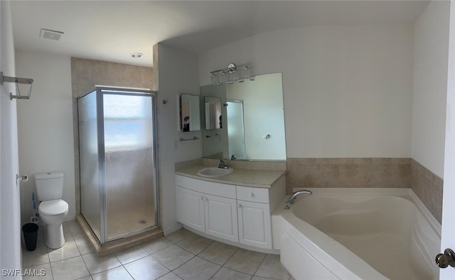 full bathroom featuring tile patterned floors, vanity, toilet, and plus walk in shower