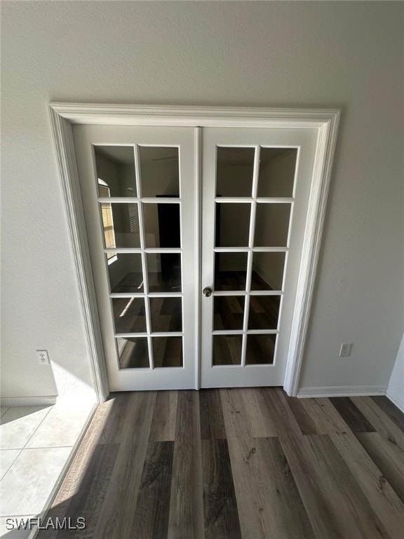 room details with hardwood / wood-style floors and french doors