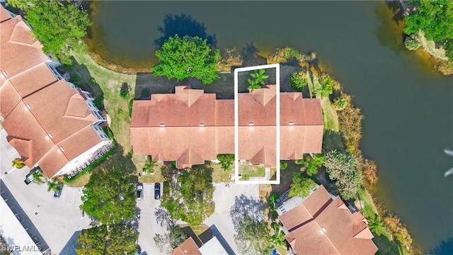 drone / aerial view featuring a water view