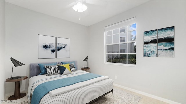 bedroom with carpet floors and multiple windows