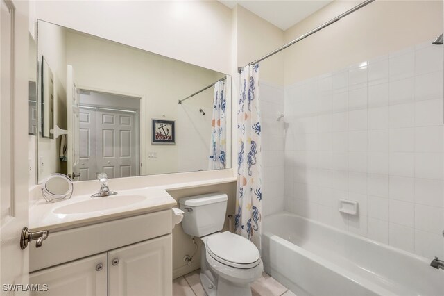 full bathroom featuring vanity, toilet, and shower / tub combo