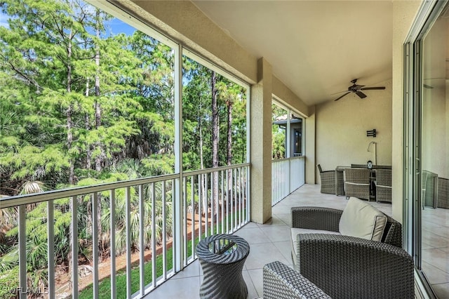 balcony featuring ceiling fan