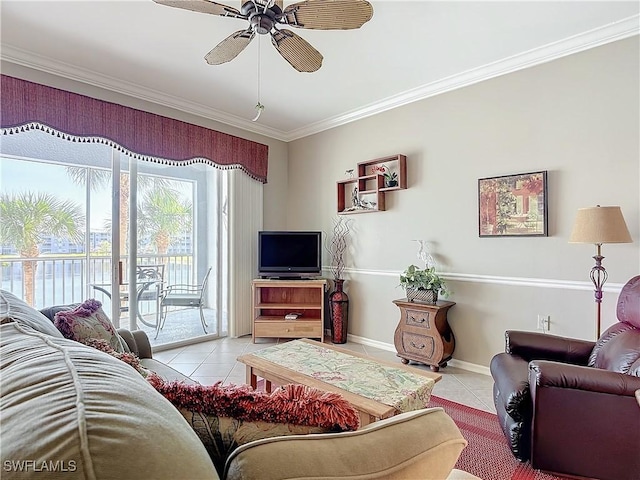 tiled living room featuring ceiling fan and ornamental molding