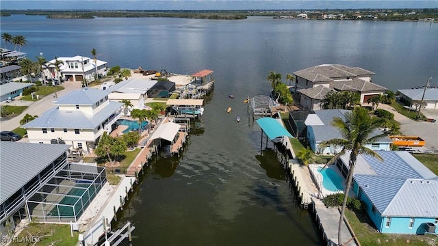 bird's eye view featuring a residential view and a water view