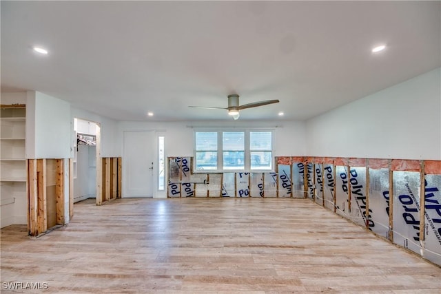 spare room featuring a ceiling fan, recessed lighting, and wood finished floors