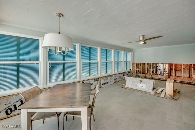 unfurnished dining area with ceiling fan