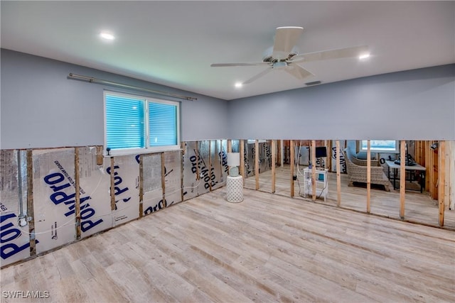 unfurnished room with recessed lighting, wood finished floors, visible vents, and a ceiling fan