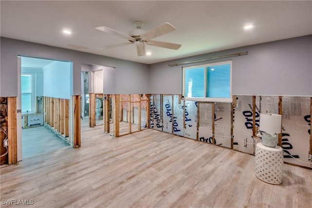 empty room featuring light hardwood / wood-style flooring and ceiling fan