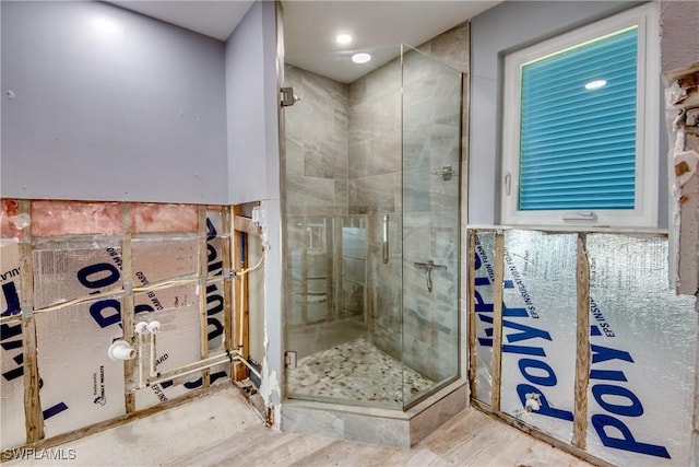 bathroom featuring an enclosed shower