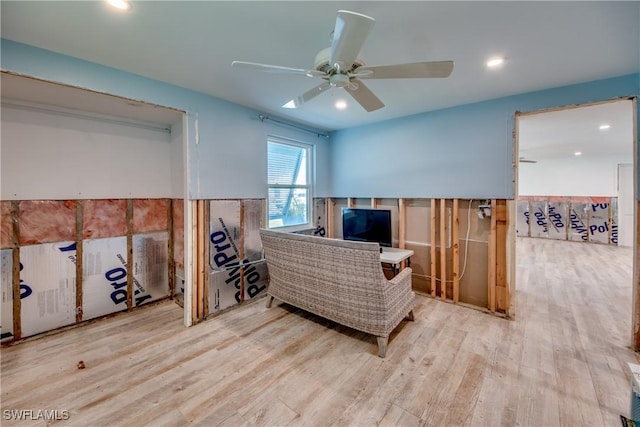 living area featuring recessed lighting, ceiling fan, and wood finished floors