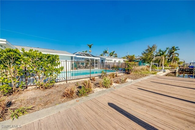 view of swimming pool with a water view