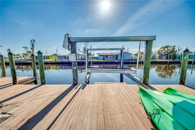 view of dock with a water view