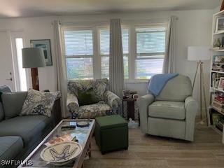 living area with wood finished floors