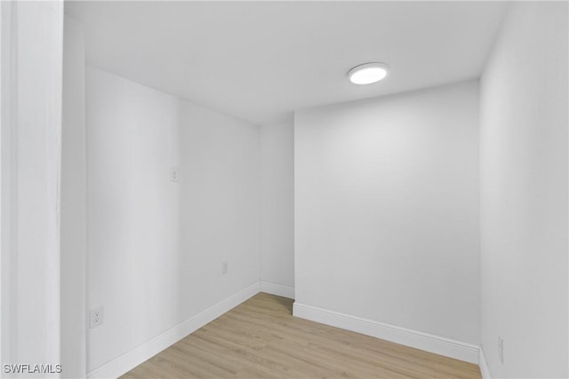 unfurnished room featuring light wood-type flooring