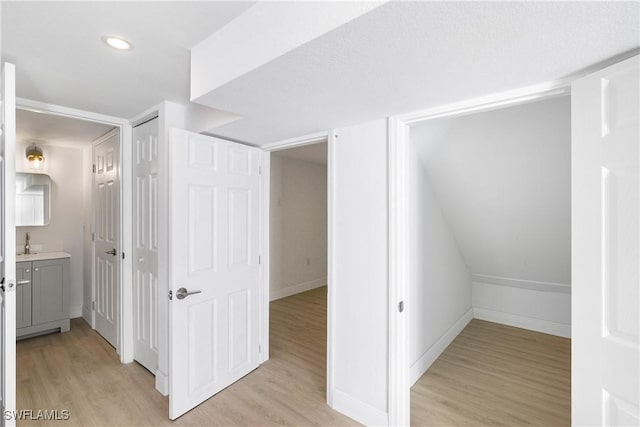 hallway featuring light hardwood / wood-style flooring