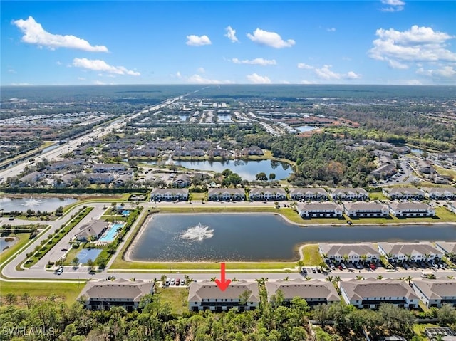 drone / aerial view featuring a water view